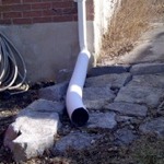downspout correctly discharging away from the building